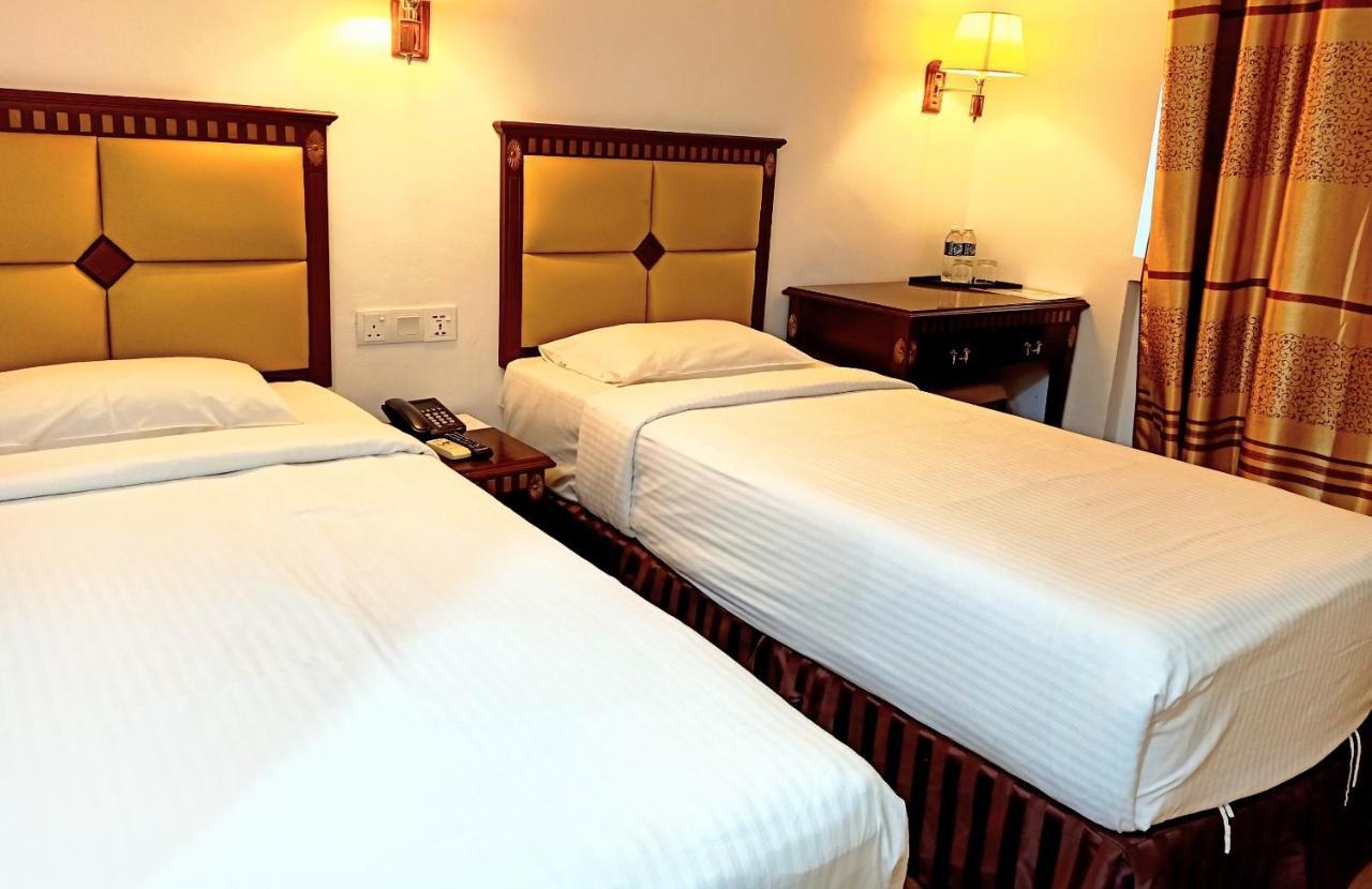 Super Oyo 90464 Borneo Suites Hotel Кота Кинабалу Екстериор снимка