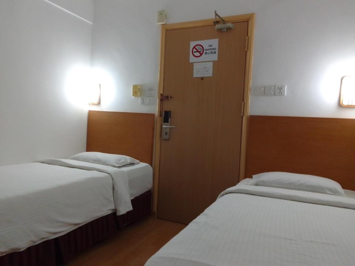 Super Oyo 90464 Borneo Suites Hotel Кота Кинабалу Екстериор снимка