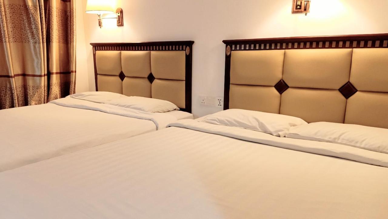 Super Oyo 90464 Borneo Suites Hotel Кота Кинабалу Екстериор снимка